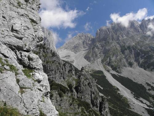 a view of a rocky mountain with a road at Ferienwohnungen Salvenmoser Johanna in Scheffau am Wilden Kaiser
