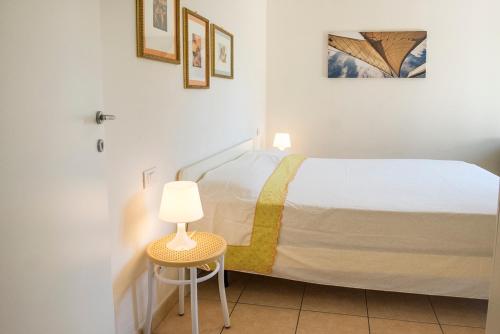 Postel nebo postele na pokoji v ubytování N011 - Numana, nuovo bilocale con giardino