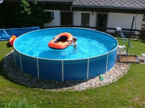 a boy in an inflatable at Chalupa u Vyšanských in Jilemnice