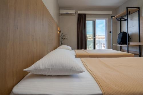 Posteľ alebo postele v izbe v ubytovaní Bemyguest Comfort Zefyros