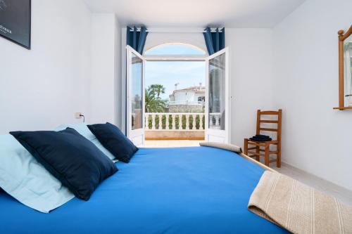 מיטה או מיטות בחדר ב-Apartamento Aigua Blava