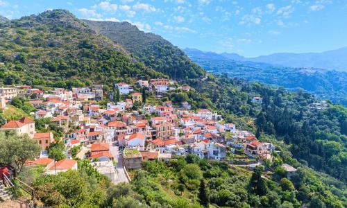 an aerial view of a village on a mountain at Villa Barozziana Private Heated Pool & Jacuzzi in Rethymno Town