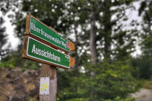 a street sign for austbush institution in a park at Hotel am Badepark Waldkirchen in Waldkirchen