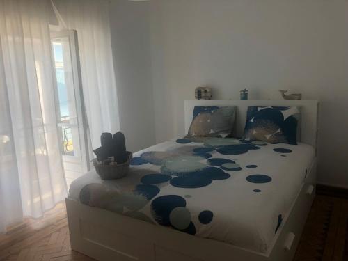 Un pat sau paturi într-o cameră la Lagos Haven Guesthouse