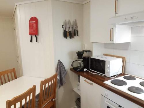 Dapur atau dapur kecil di Fjord side apartment