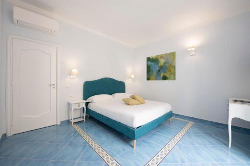 Katil atau katil-katil dalam bilik di Amalfitano Apartments