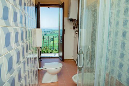 Koupelna v ubytování casa di Faustina (albergo diffuso)