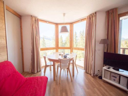 Appartement Valmorel, 3 pièces, 6 personnes - FR-1-291-731にあるシーティングエリア