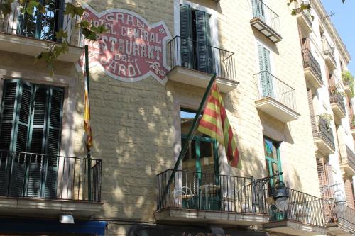 a building with a sign on it at El Jardi in Barcelona