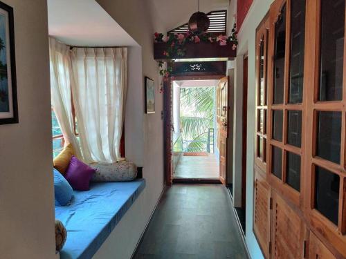 Гостиная зона в Anandam Stays - Premium 3BHK plush homestay, Vaikom near Kumarakom