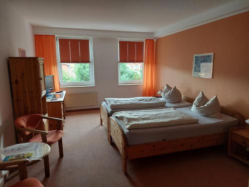 Neustädter Hof Hotel Garniにあるベッド