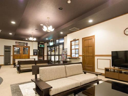 TV a/nebo společenská místnost v ubytování LiVEMAX RESORT Aki Miyahama Onsen