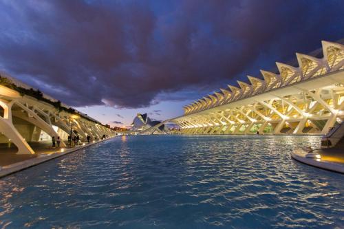 a bridge over the water with the sydney opera house in the background at Cullera Panoramic Sea Views Apartment in Cullera