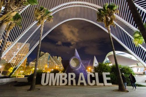 a view of the entrance to the entrance to the universal miracle sign at night at Cullera Panoramic Sea Views Apartment in Cullera