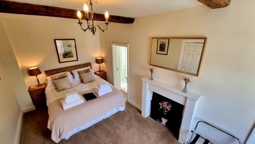 Ένα ή περισσότερα κρεβάτια σε δωμάτιο στο Antlers Bed and Breakfast