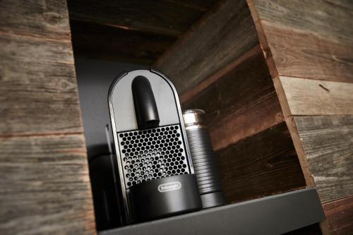 a black and grey item in a wooden box at Auhäuslalm in Maria Alm am Steinernen Meer