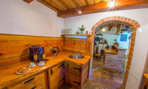 a kitchen with a sink and a counter top at Ranc Vitina in Ljubuški