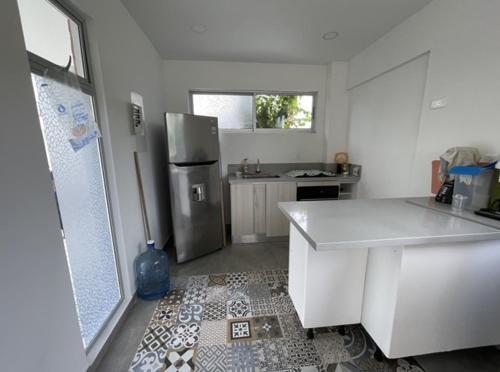 Kuchyň nebo kuchyňský kout v ubytování Zion House