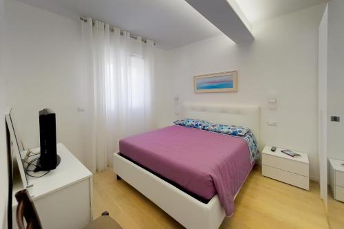 Posteľ alebo postele v izbe v ubytovaní Casa di Nada - Goelba