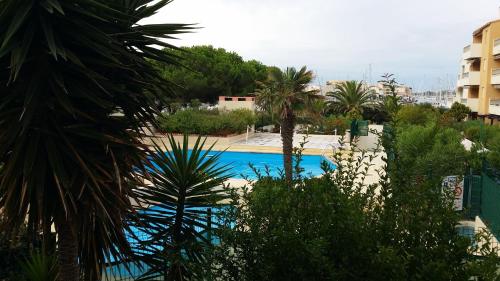 a view of a swimming pool from a resort at La Voile D' Or in Cap d'Agde