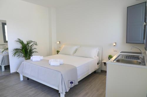 Ένα ή περισσότερα κρεβάτια σε δωμάτιο στο Giardino di Edo