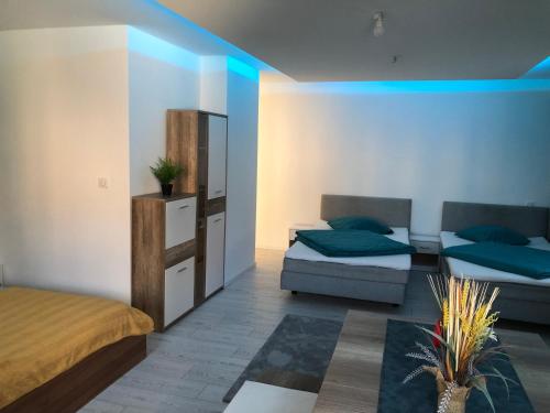 Postel nebo postele na pokoji v ubytování Appartement Willa chez willi