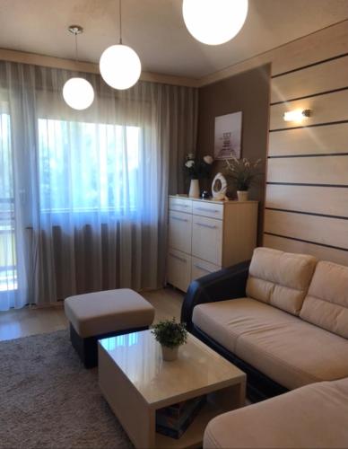 Posezení v ubytování Bervia Apartman Keszthely