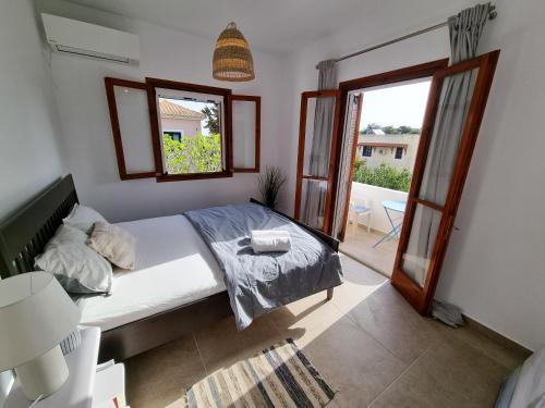Posteľ alebo postele v izbe v ubytovaní Yvi´s Greek House