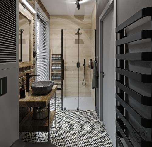 a bathroom with a shower and a sink at Apartament z widokiem na Zatokę Gdańską in Gdańsk