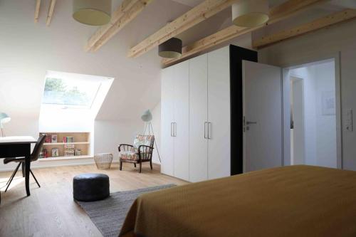 Un pat sau paturi într-o cameră la Pegnitz Apartement