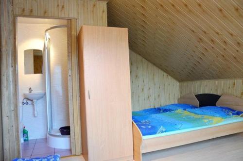 Posteľ alebo postele v izbe v ubytovaní Pati Apartament Słonko