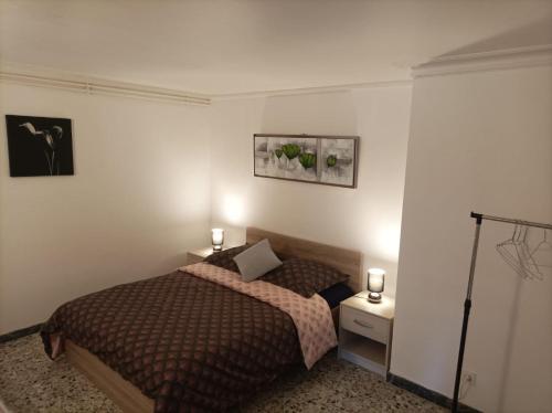 Posteľ alebo postele v izbe v ubytovaní Le pain perdu de germaine