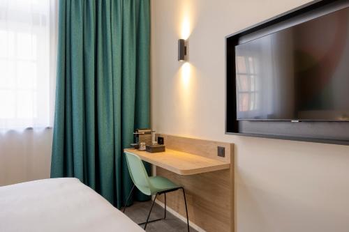 Postel nebo postele na pokoji v ubytování B&B HOTEL Hasselt