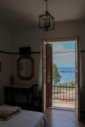 Ένα ή περισσότερα κρεβάτια σε δωμάτιο στο Στρατής