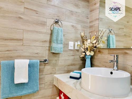 Ванная комната в Ocean View Modern Condo & Luxury Amenities