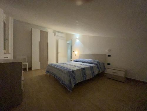 Katil atau katil-katil dalam bilik di Terrazze Marinella - Appartamenti - Case vacanze
