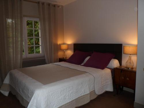 Кровать или кровати в номере Domaine de La Héllière