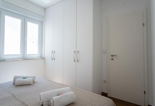 Cama ou camas em um quarto em Apartment Mia Šimuni