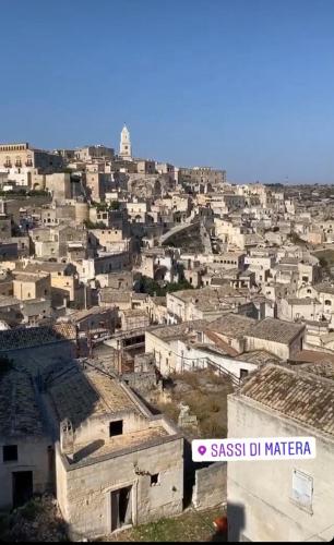 an aerial view of a city with buildings at Lucky’s house in Noicattaro