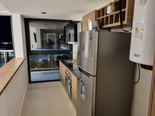 Η κουζίνα ή μικρή κουζίνα στο Departamento 2 amb frente a Casino