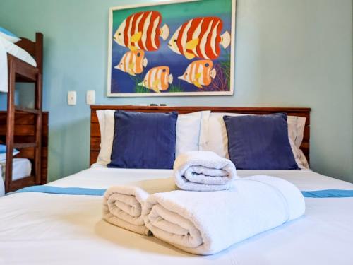 Cama o camas de una habitación en Pousada Cachadaço