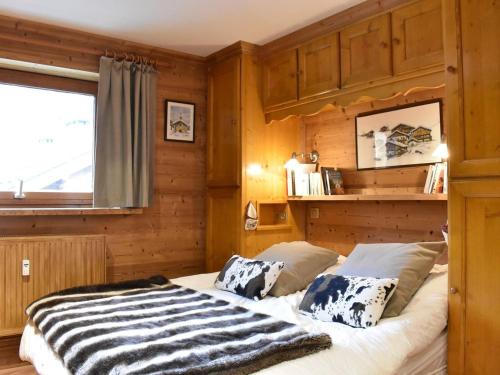 Ένα ή περισσότερα κρεβάτια σε δωμάτιο στο Appartement Méribel, 3 pièces, 5 personnes - FR-1-180-552