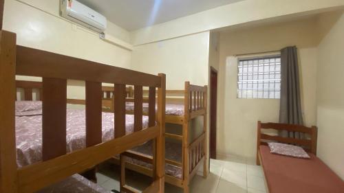 Двухъярусная кровать или двухъярусные кровати в номере Apart-Norte Flat Belém Aeroporto