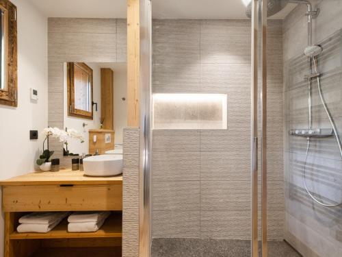 a bathroom with a shower and a sink at Chalet La Clusaz, 6 pièces, 12 personnes - FR-1-304-270 in La Clusaz
