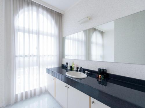 Kuchyň nebo kuchyňský kout v ubytování Spa Resort LiVEMAX