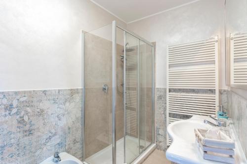a bathroom with a shower and a sink at Oasi Borghetto Verde in Castellaro