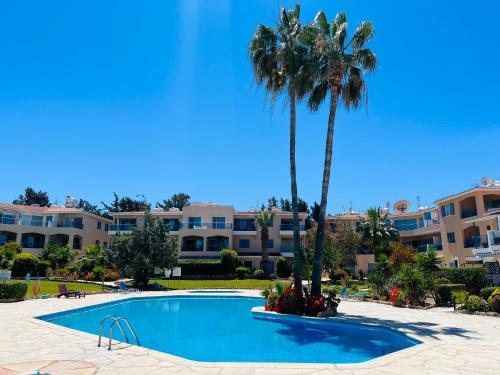 Πισίνα στο ή κοντά στο Golden Palms Paradise Garden