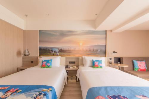 Postel nebo postele na pokoji v ubytování Atour Hotel Hohhot Drum Tower Manduhai
