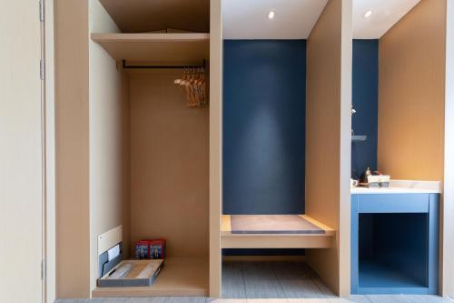 Μια τηλεόραση ή/και κέντρο ψυχαγωγίας στο Atour Hotel Changde Laoximen