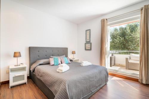 Postel nebo postele na pokoji v ubytování Villa Ohana